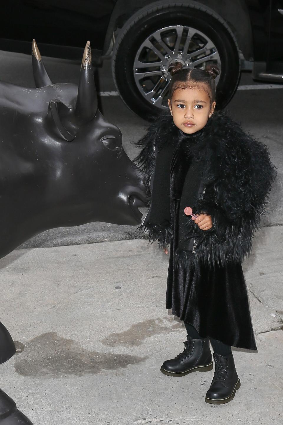 <p>When in New York, dress like a New Yorker. No child does the all black goth look better than North. (Photo: Backgrid) </p>