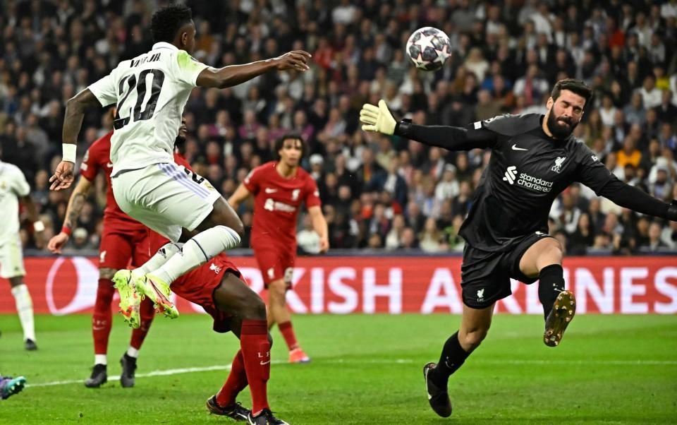 Alisson stops Vinicius Jr - JAVIER SORIANO/AFP