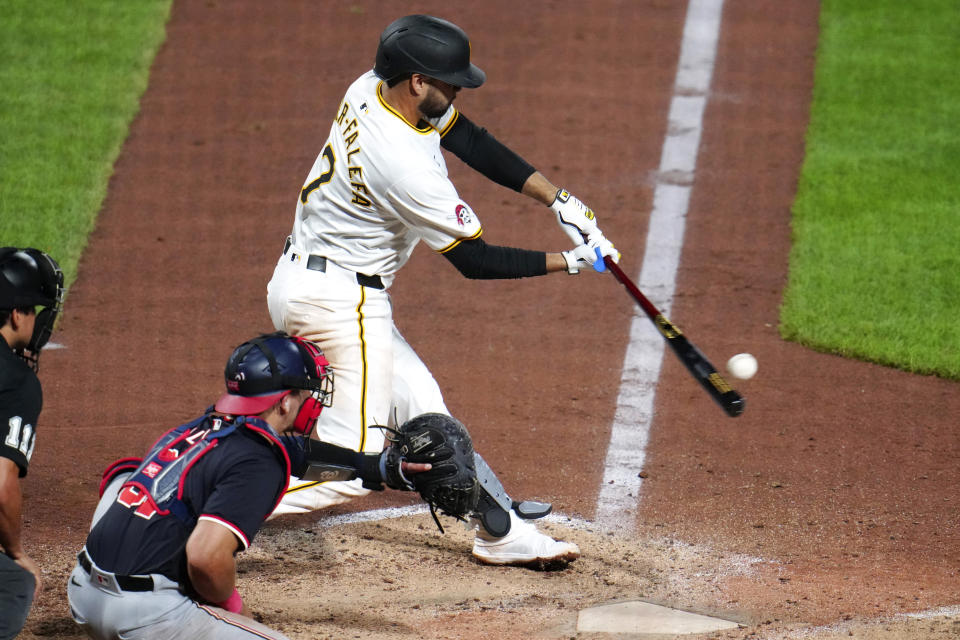 Pittsburgh Pirates' Isiah Kiner-Falefa (7) singles off Washington Nationals relief pitcher Jacob Barnes, driving in a run, during the eighth inning of the second baseball game of a doubleheader in Pittsburgh, Saturday, Sept. 7, 2024. (AP Photo/Gene J. Puskar)