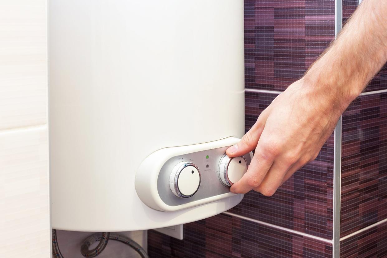 hands on settings of a water heater