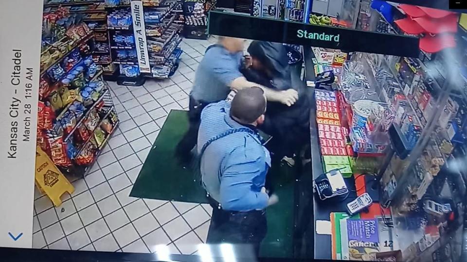 This still from surveillance video shows Kansas City police confronting Malcolm Johnson in a March 25, 2021, incident in a convenience store. Johnson was shot twice in the head and died.
