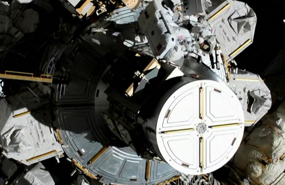 Astronauts Christina Koch and Jessica Meir, top right, exit the International Space Station on Oct. 18, 2019. | NASA/AP