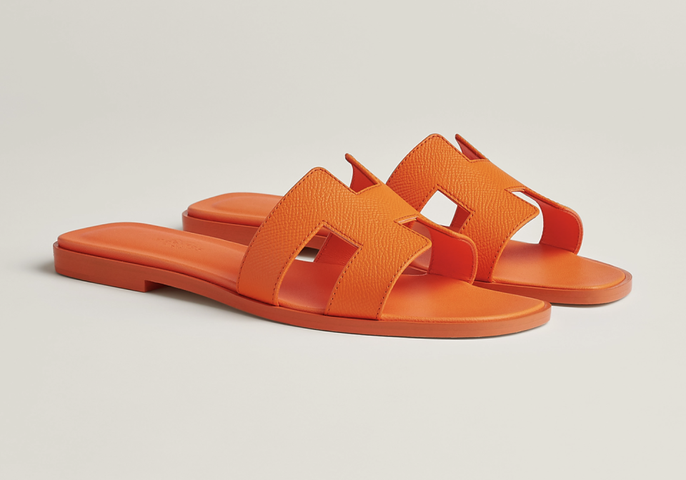 a pair of orange sandals