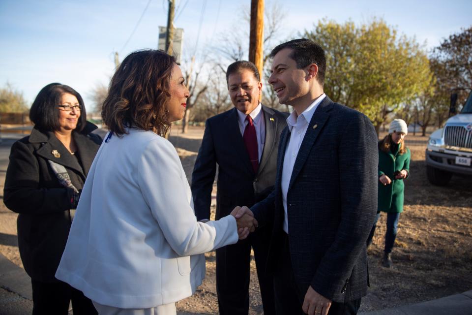 Kasandra Gandara, mayor pro-tem and District 1 councilor, shakes Secretary of Transportation Pete Buttigieg's  hand on Wednesday, April 5, 2023, in Las Cruces.