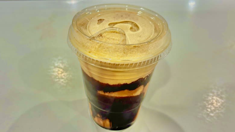 Frozen coffee drink in plastic cup