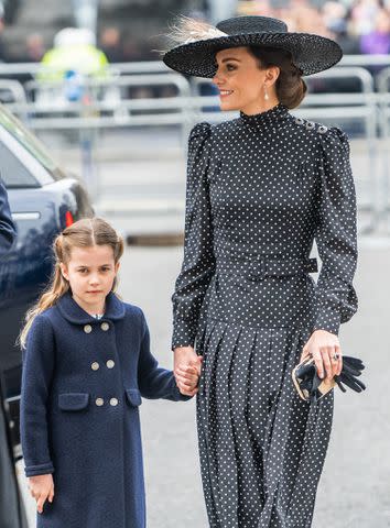 <p>Samir Hussein/WireImage</p> Princess Charlotte and Kate Middleton attend the memorial service for Prince Philip in March 2022.