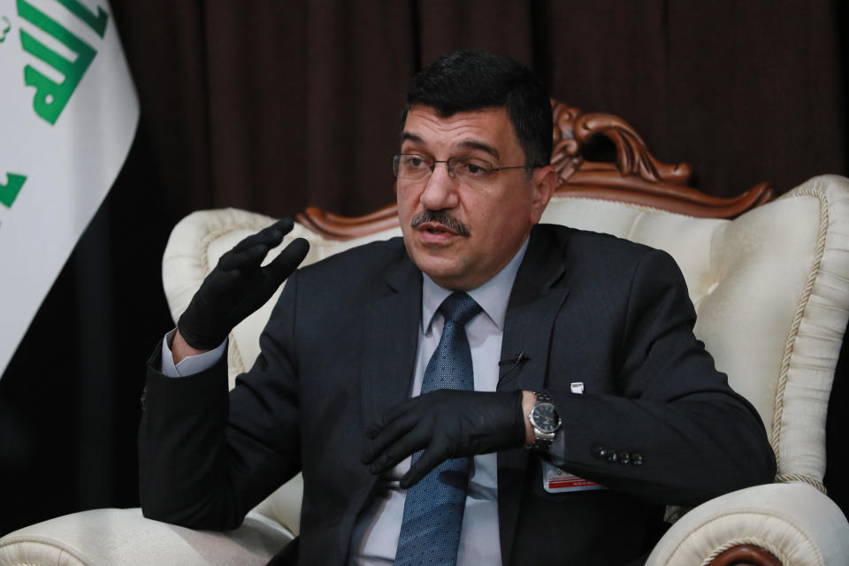 Iraq's Water Resources Minister Mahdi Rashid Al-Hamdani speaks during an interview in Baghdad, Iraq on Thursday, July 16, 2020. Al-Hamdani says severe shortages loom ahead if Iraq and neighboring Turkey fail to strike agreements over irrigation and dam projects. (AP Photo/Hadi Mizban)