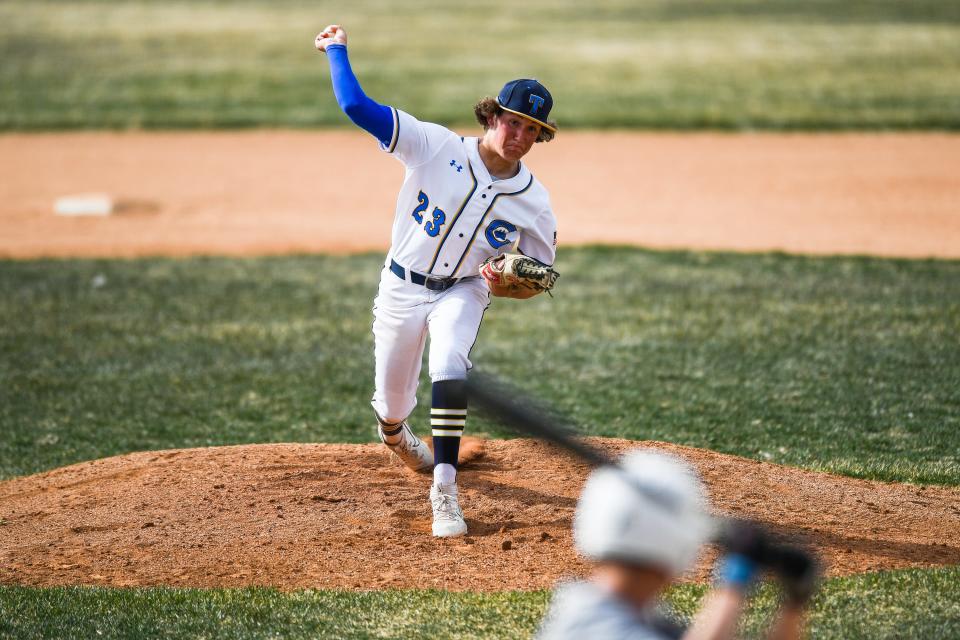 Timnath's Drake Jenkins (23) delivers a pitch during a high school baseball game against Wellington at Timnath Middle-High School on April 12, 2023.