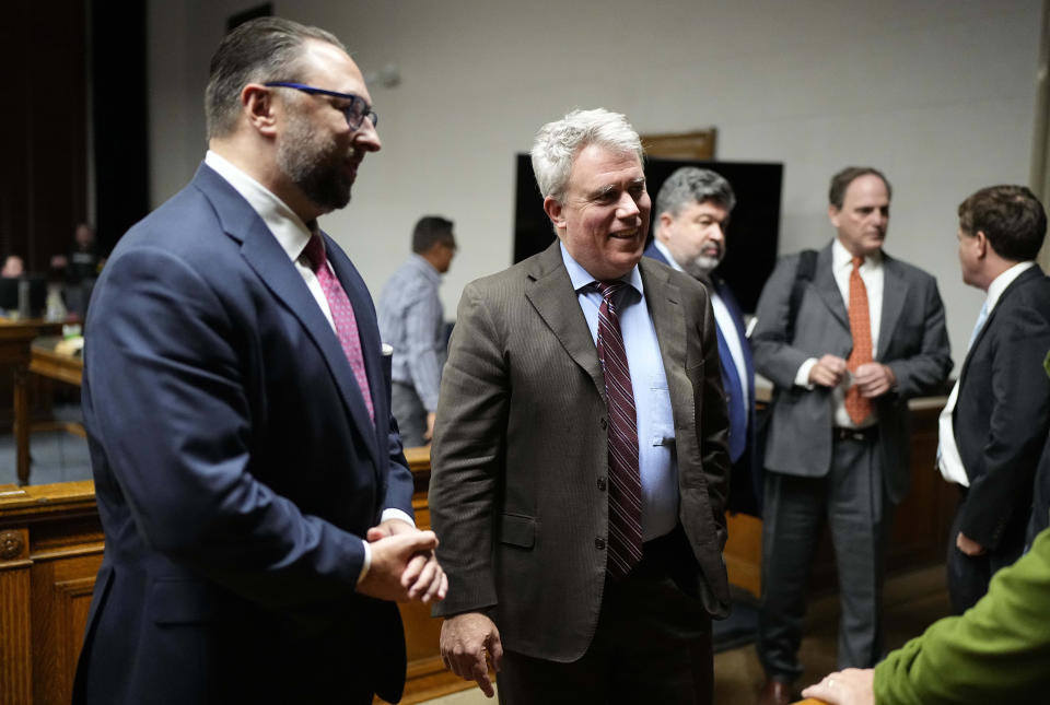 Scott Gessler, center, attorney for former President Donald Trump, talks with team members after closing arguments in a hearing for a lawsuit to keep former President Donald Trump off the state ballot in court, Wednesday, Nov. 15, 2023, in Denver. (AP Photo/Jack Dempsey, Pool)