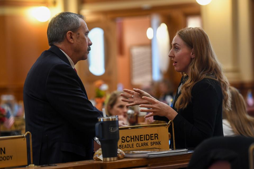 Representative Kadyn Wittman talks to another legislator after the State of the State address on Tuesday, Jan. 9, 2024 at South Dakota State Capitol in Pierre.