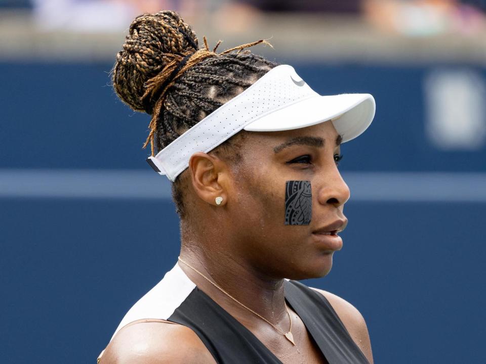 Serena Williams reacts during her National Bank Open tennis tournament first round match.