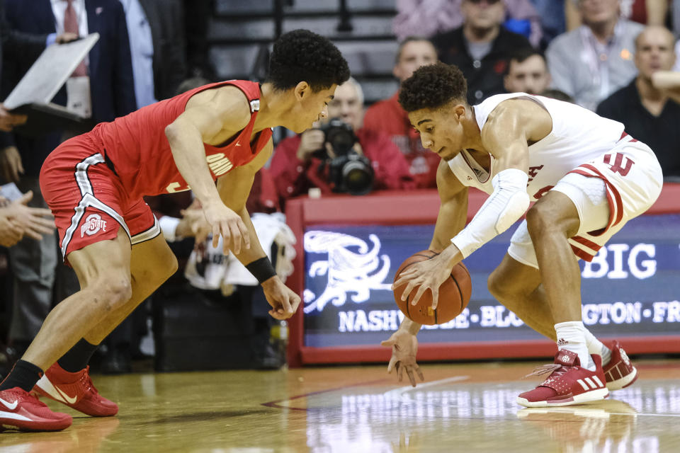 Indiana guard Rob Phinisee, right, steals the ball from Ohio State guard D.J. Carton during the first half of an NCAA college basketball game in Bloomington, Ind., Saturday, Jan. 11, 2020. (AP Photo/AJ Mast)