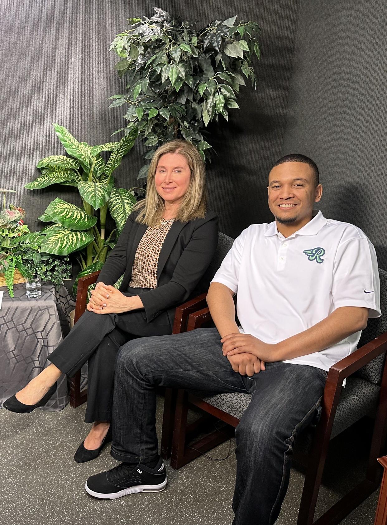 Cannabis Control Commissioner Kimberly Roy, left, and co-founder of Rolling Releaf, a cannabis delivery service, Devin Alexander at Quincy Access Television studios.