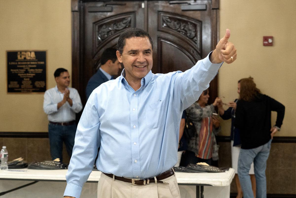 Cuellar walks into his election watch party to celebrate with his supporters on election night, Nov. 8, 2022, in Laredo.