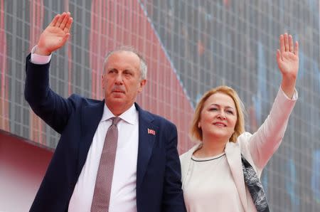 Muharrem Ince, presidential candidate of Turkey's main opposition Republican People's Party (CHP), and his wife Ulku, wave to supporters during an election rally in Istanbul, Turkey June 23, 2018. REUTERS/Osman Orsal
