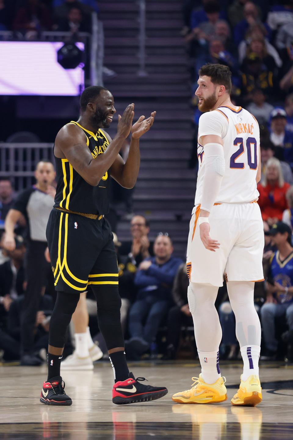 Draymond Green reacts after being fouled by Jusuf Nurkic during Saturday's game.