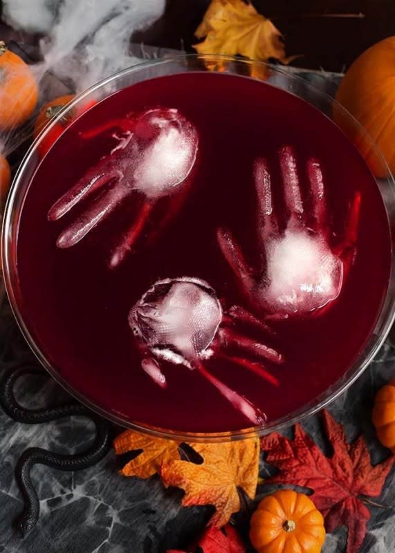 <p>Simply Happy Foodie</p><p>Spooky Halloween party punch is a fun drink to serve your guests at your Halloween Party. Scary ice sculptures make a chilling addition to this bloody delicious beverage.</p><p><strong>Get the recipe: <a href="https://www.simplyhappyfoodie.com/spooky-halloween-party-punch/" rel="nofollow noopener" target="_blank" data-ylk="slk:Spooky Halloween Party Punch;elm:context_link;itc:0;sec:content-canvas" class="link rapid-noclick-resp"><em>Spooky Halloween Party Punch</em></a></strong></p>