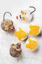 <p>It's a mouse ... duh! Give your cupcakes a cute costume with tinted coconut for the mice and flattened circus peanuts for the cheese.</p><p>Get the recipe from <a href="https://www.goodhousekeeping.com/food-recipes/dessert/a22577411/mouse-cupcakes-recipe/" rel="nofollow noopener" target="_blank" data-ylk="slk:Good Housekeeping;elm:context_link;itc:0;sec:content-canvas" class="link ">Good Housekeeping</a>.</p>