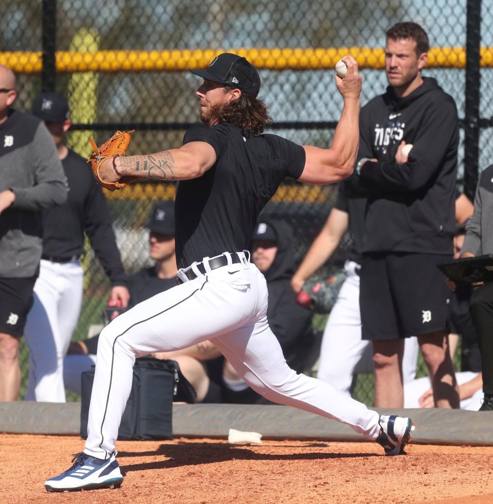 Detroit Tigers pitchers and catchers went through drills and a bullpen session during Spring Training Tuesday, February 14, 2023. Pitching coach Chris Fetter watches Michael Lorenzen throw during his bullpen session during practice.