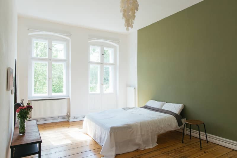 A simple bedroom with natural light