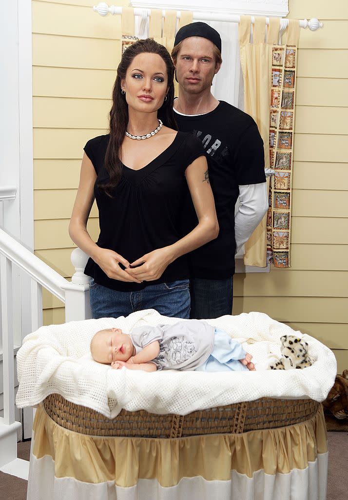 The Shiloh Nouvel Jolie Pitt wax figure debuts at Madame Tussauds with her parents' wax figures on July 26, 2006, in New York City. (Photo: Scott Gries/Getty Images)