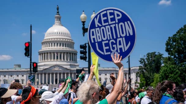 PHOTO: Abortion-rights activists demonstrate against the Supreme Court decision to overturn Roe v. Wade that established a constitutional right to abortion, on Capitol Hill, June 30, 2022.  (J. Scott Applewhite/AP)