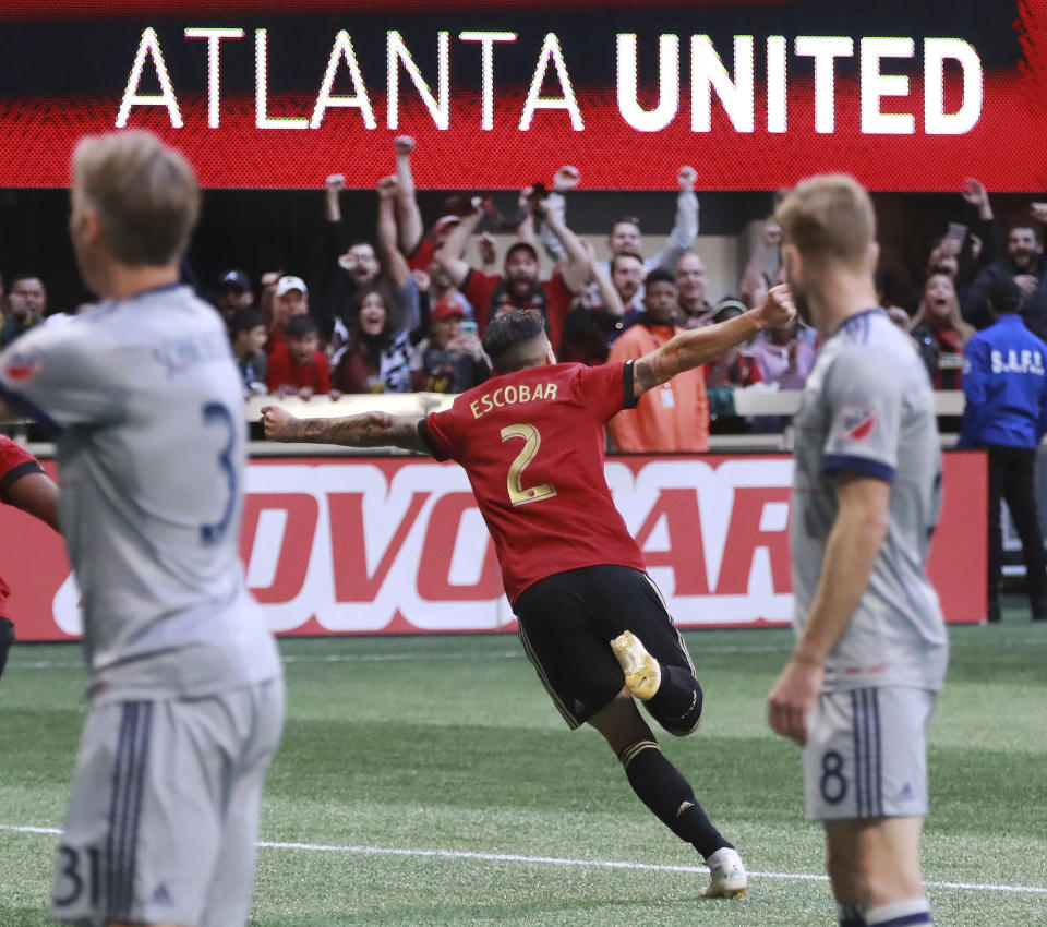 Atlanta United defender Franco Escobar (2) celebrates his goal for a lead over the Chicago Fire during the first half of an MLS soccer match on Sunday, Oct. 21, 2018, in Atlanta. (Curtis Compton/Atlanta Journal-Constitution via AP)