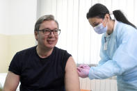 In this photo provided by the Serbian Presidential Press Service, Serbian President Aleksandar Vucic receives a dose of the Chinese Sinopharm vaccine in the village of Rudna Glava, Serbia, Tuesday, April 6, 2021. Vucic finally rolled up his sleeve for a coronavirus vaccine Tuesday and to encourage his country's increasingly skeptical Serbs to get vaccinated themselves. (Serbian Presidential Press Service via AP)
