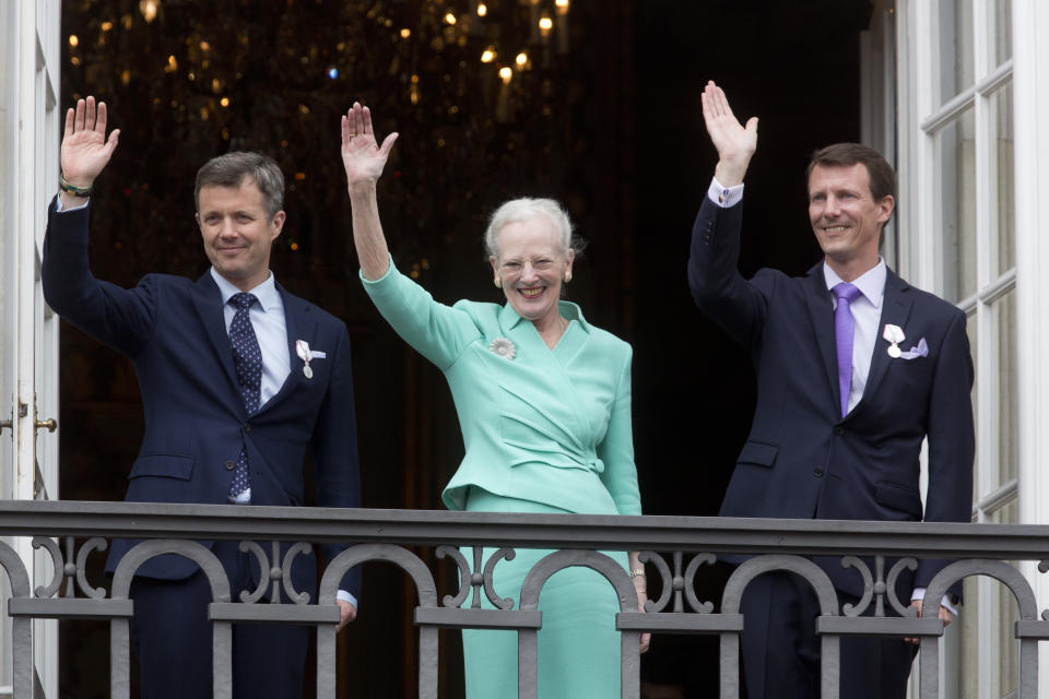 Queen Margrethe II of Denmark, and her sons Crown Prince Frederik of Denmark (L) and Prince Joachim of Denmark (R) appear on the Balcony of Amalienborg Palace on her 75th Birthday, on April 16, 2015 in Copenhagen, Denmark.