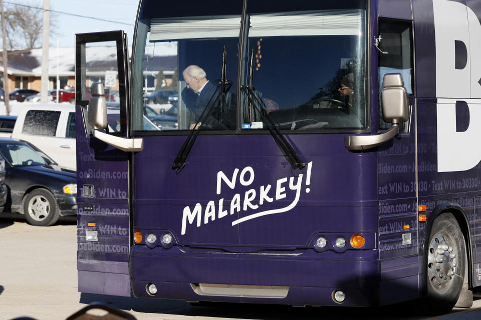 Democratic presidential candidate former Vice President Joe Biden arrives at a stop on his bus tour, Monday, Dec. 2, 2019, in Emmetsburg, Iowa. (AP Photo/Charlie Neibergall)