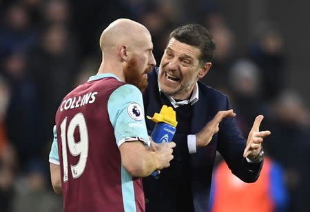 Britain Football Soccer - West Ham United v Crystal Palace - Premier League - London Stadium - 14/1/17 West Ham United's James Collins speaks with manager Slaven Bilic Action Images via Reuters / Tony O'Brien Livepic