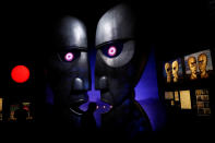 <p>Visitors are silhouetted at The Pink Floyd Exhibition: Their Mortal Remains at the V&A Museum in London, Britain May 9, 2017. (Photo: Stefan Wermuth/Reuters) </p>