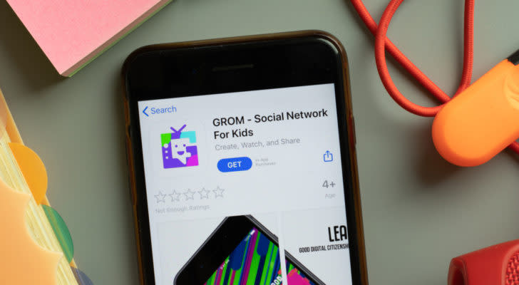 GROM stock: a phone displaying the GROM social network app page in the app store