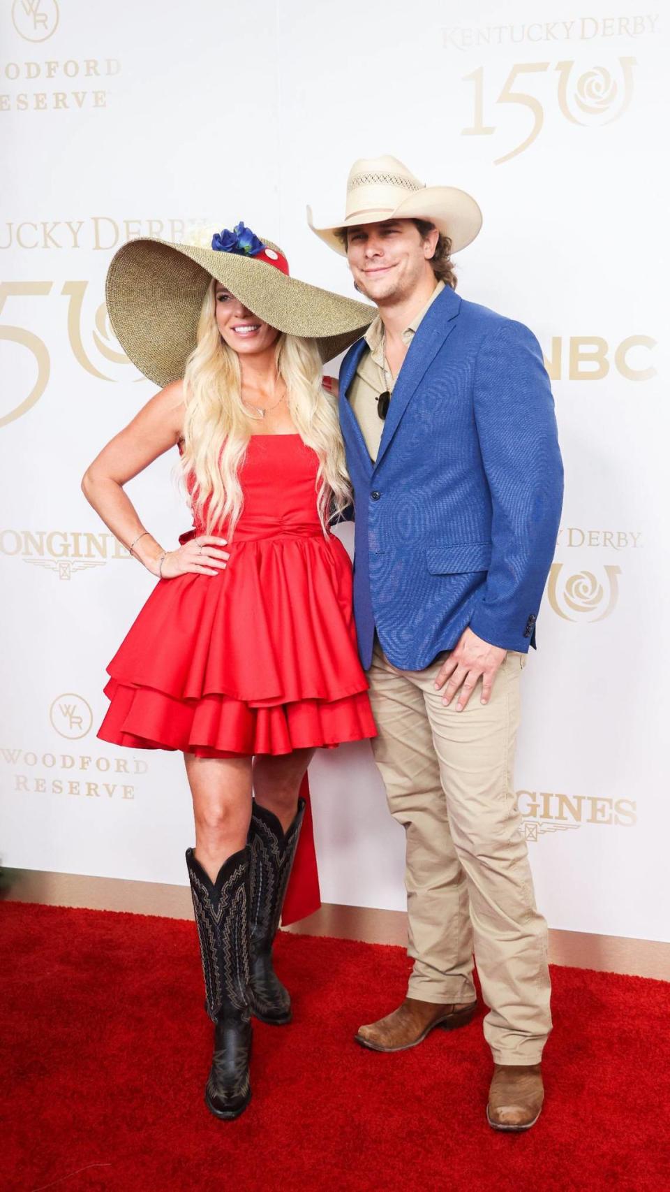 Randall King and Brittany Warthan pose for a photo on the red carpet at the Kentucky Derby on Saturday, May 4, 2024, at Churchill Downs in Louisville, Kentucky.