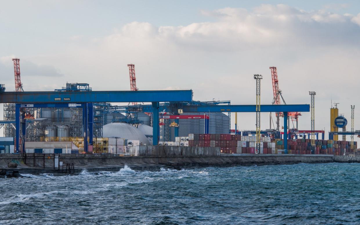 Silos and containers on the dockside at the Port of Odesa in Ukraine cannot be shipped as the war continues - Nathan Laine/Bloomberg