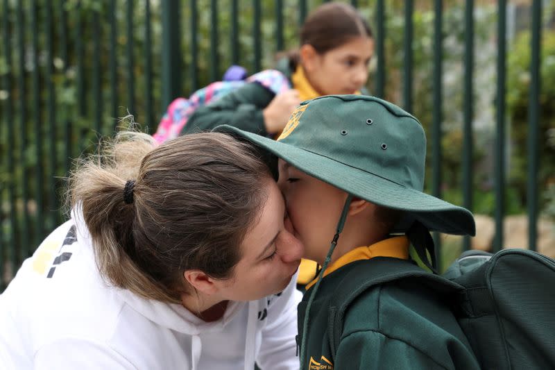 Children return to campus for the first day of New South Wales public schools fully re-opening in Sydney