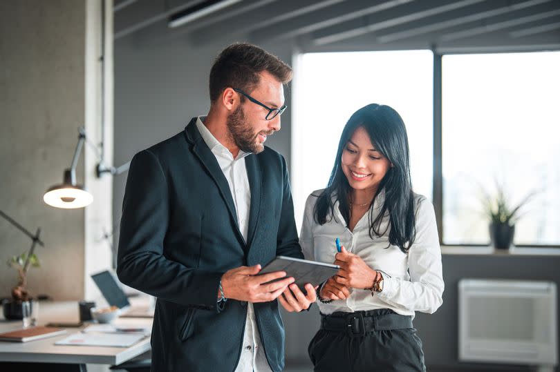 Her boss has promised her a car if he wins  but he doesn't know her secret [stock image]