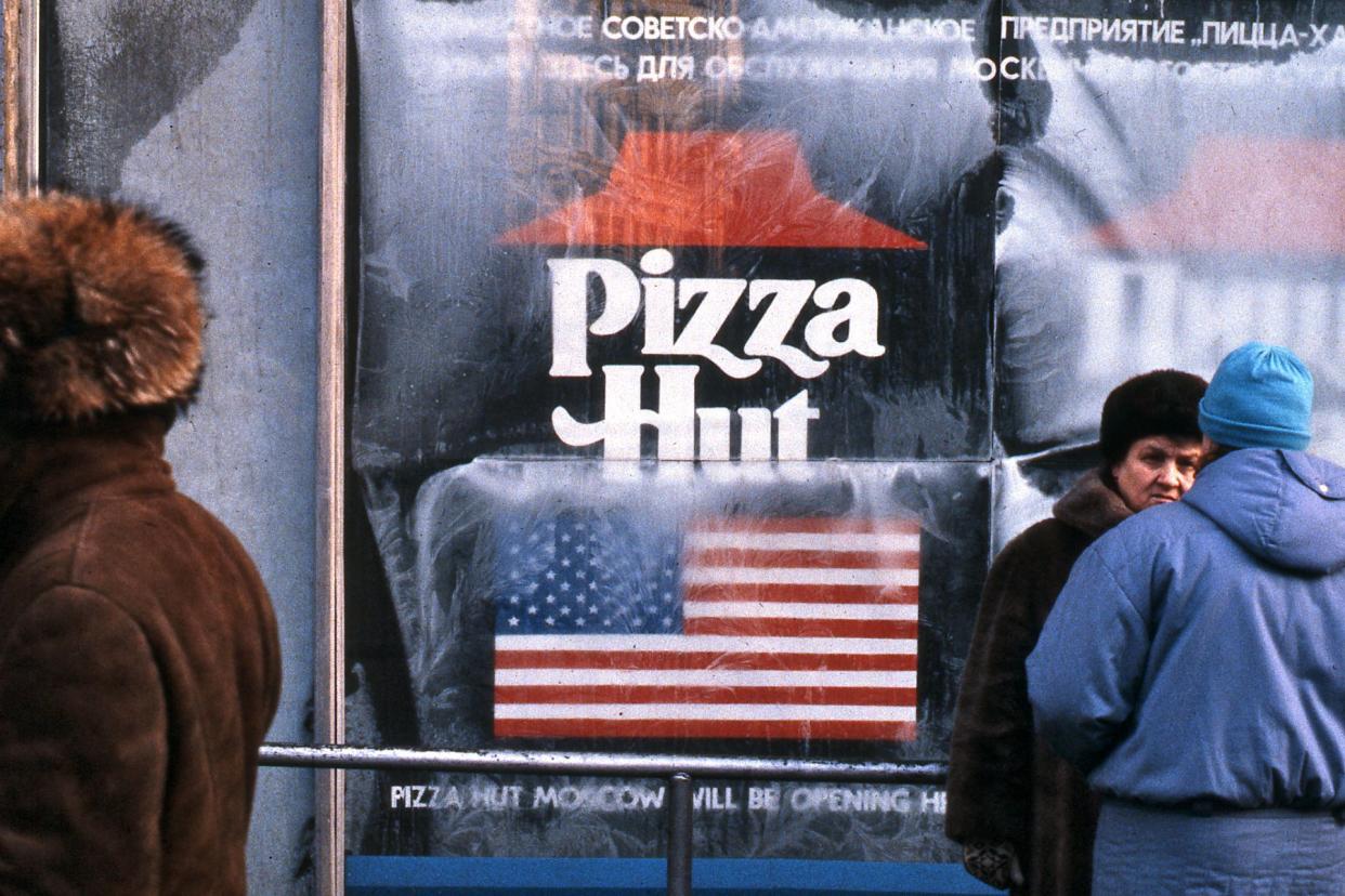 Pizza Hut sign, including an American flag, while the store was being prepared for opening