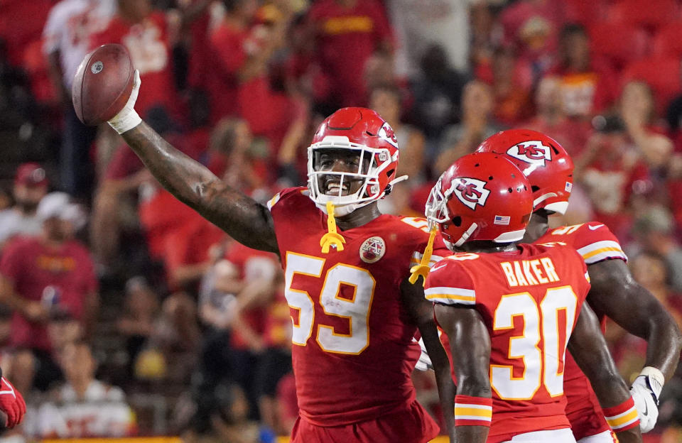 Aug 27, 2021; Kansas City, Missouri, USA; Kansas City Chiefs defensive end Joshua Kaindoh (59) celebrates after an interception against the Minnesota Vikings during the second half at GEHA Field at Arrowhead Stadium. Mandatory Credit: Denny Medley-USA TODAY Sports