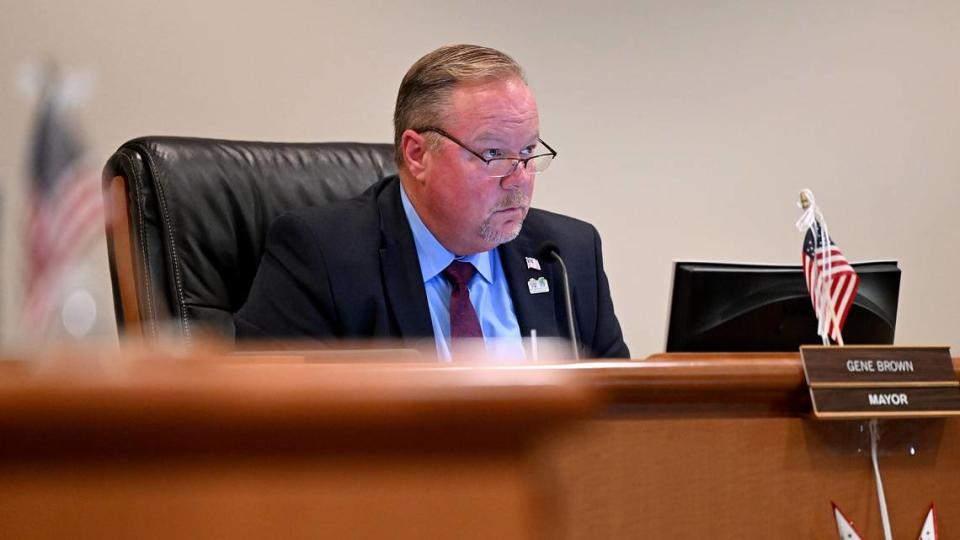 Mayor Gene Brown listens to a speaker during a meeting where the Bradenton City Council approved an agreement that allows for the construction of a hotel, 350 apartments, 95 condos, and retail space on waterfront land in downtown in a meeting on July 24, 2024.