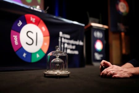 A replica of the International Prototype Kilogram is pictured is seen at the 26th meeting of the General Conference on Weights and Measures (CGPM) to vote on the redefinition of four base units of the International System of Units (SI) in Versailles, France, November 16, 2018. REUTERS/Benoit Tessier