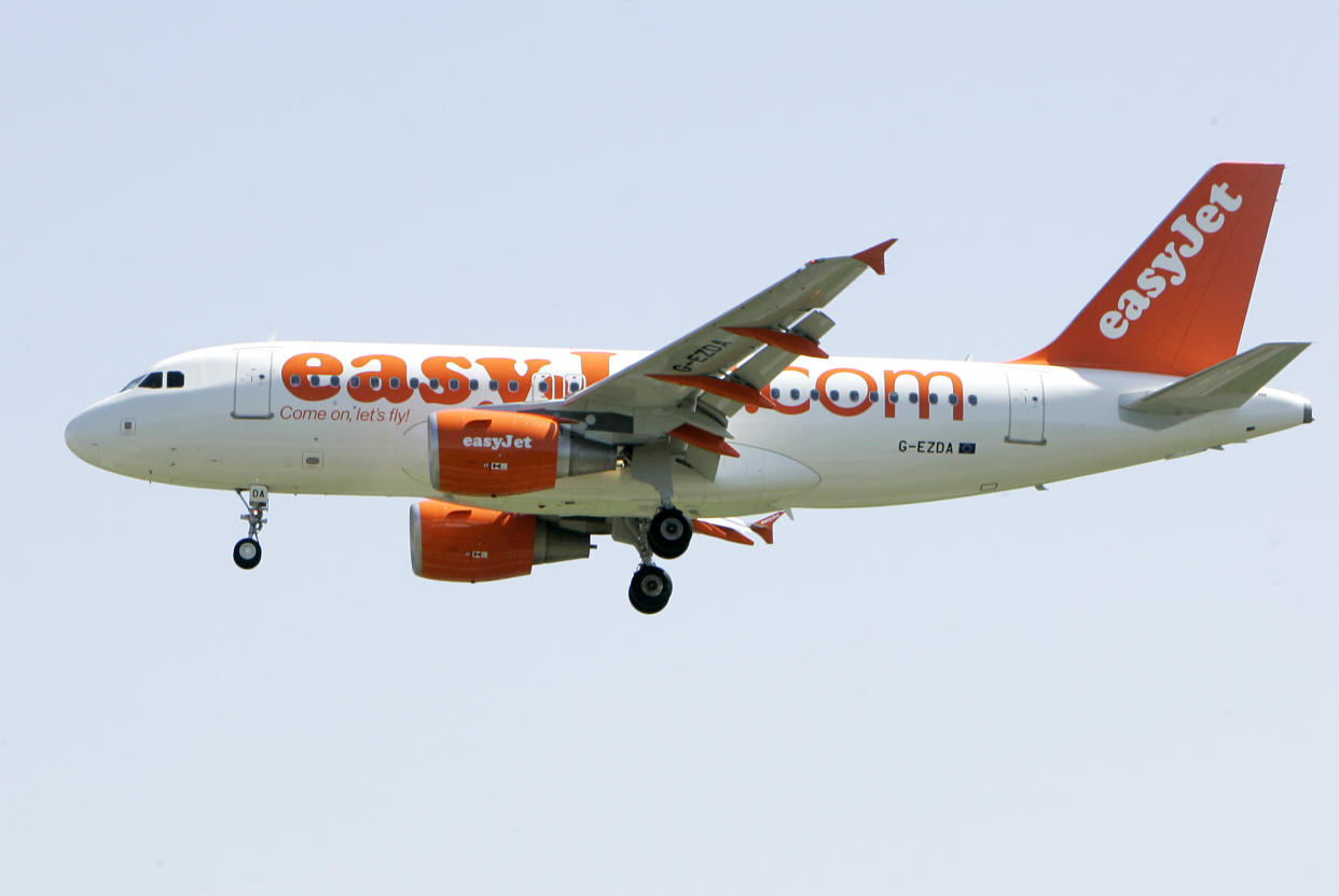 An EasyJet jetliner lands at the Milan Linate airport, Italy, Wednesday, April 23, 2008. (AP Photo/Antonio Calanni)