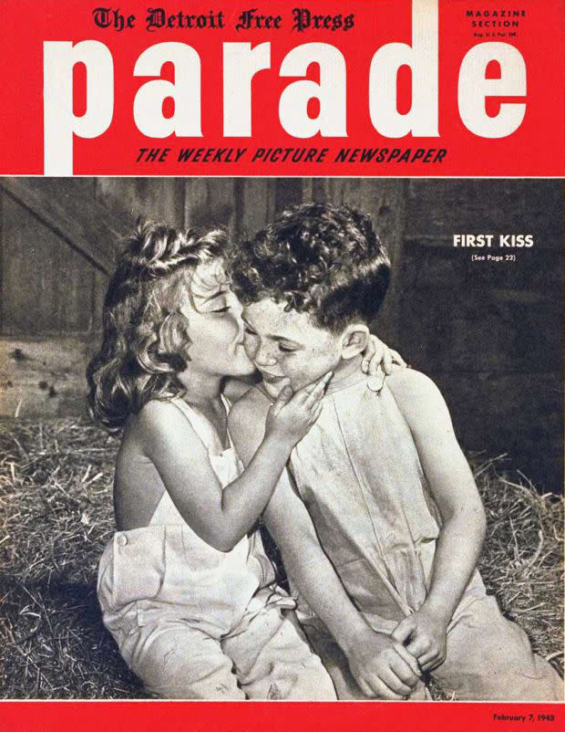 <p>The two youngsters on this <em>Parade</em> cover were enjoying to the fullest one of those rare thrills that come once in a lifetime—sharing their first kiss. Or, rather, the little girl is <em>giving</em> her first and Freckleface is <em>receiving</em> his, <em>Parade</em> reported. The photograph was snapped by Roy Pinney, who said the kids were unaware they had an audience, back in a time when that wasn't considered to be pervy.</p>