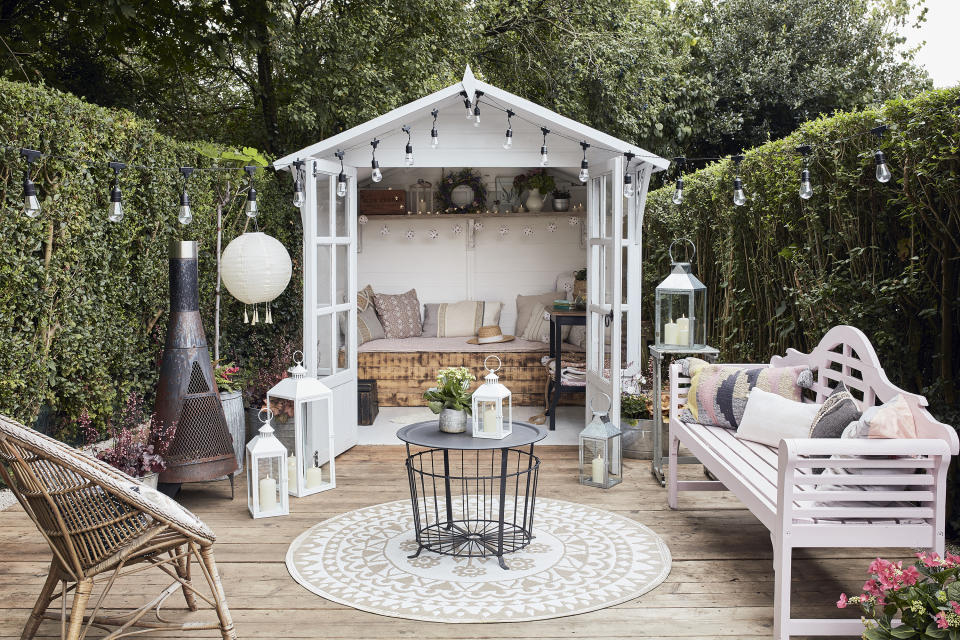 22. EXTEND YOUR SHE SHED DECOR OUTSIDE