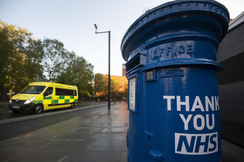 A blue postbox in support of the NHS outside St Thomas's Hospital in central London as the UK continues in lockdown to help curb the spread of the coronavirus.