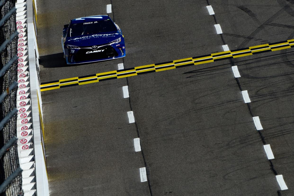 Martin Truex Jr. got his fifth pole of 2016 at Martinsville. (Getty)