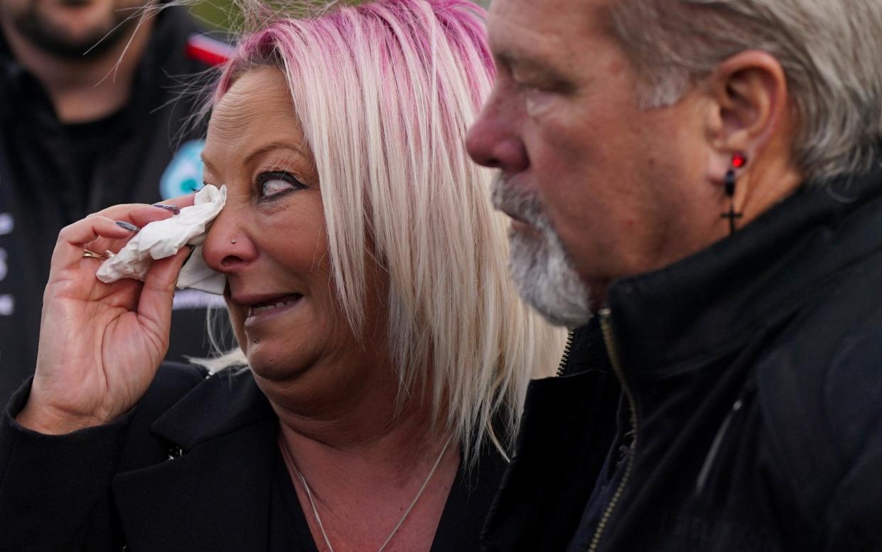 Charlotte Charles with Harry Dunn's stepfather, Bruce Charles, at the second cremation