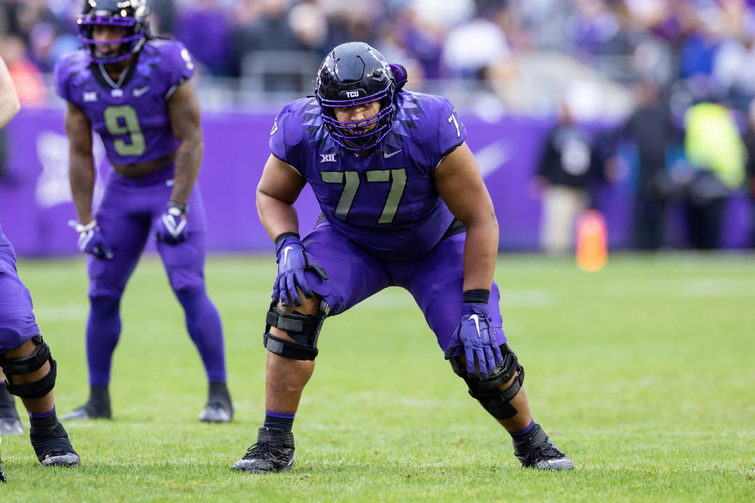 FORT WORTH, TX - NOVEMBER 26: TCU Horned Frogs offensive tackle Brandon Coleman (#77) waits for the snap during the college football game between the Iowa State Cyclones and TCU Horned Frogs on November 26, 2022 at Amon G. Carter Stadium in Fort Worth, TX. (Photo by Matthew Visinsky/Icon Sportswire via Getty Images)