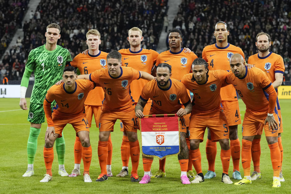 Netherlands' players line up for the international friendly soccer match between Germany and Netherlands at the Deutsche Bank Park in Frankfurt, Germany on Tuesday, March 26, 2024. (AP Photo/Martin Meissner)