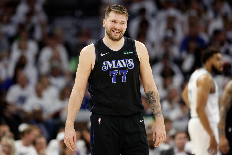 MINNEAPOLIS, MINNESOTA - MAY 24: Luka Doncic #77 of the Dallas Mavericks reacts during the third quarter against the Minnesota Timberwolves in the Western Conference Finals game at Target Center on May 24, 2024 in Minneapolis, Minnesota.  Note to User: By downloading or using this photo, the user expressly acknowledges and agrees that the user agrees to the terms and conditions of the Getty Images License Agreement.  (Photo by David Berting/Getty Images)